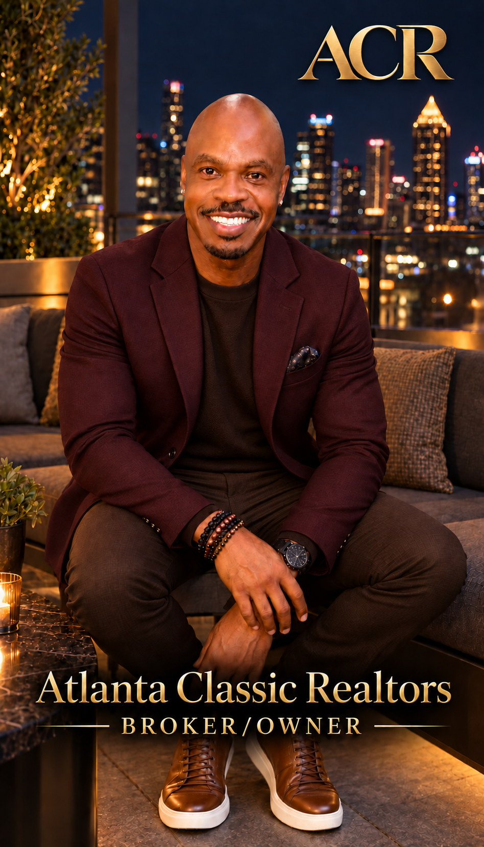 Cal Robertson seated overlooking the Atlanta skyline, with Atlanta Classic Realtors Broker/Owner branding